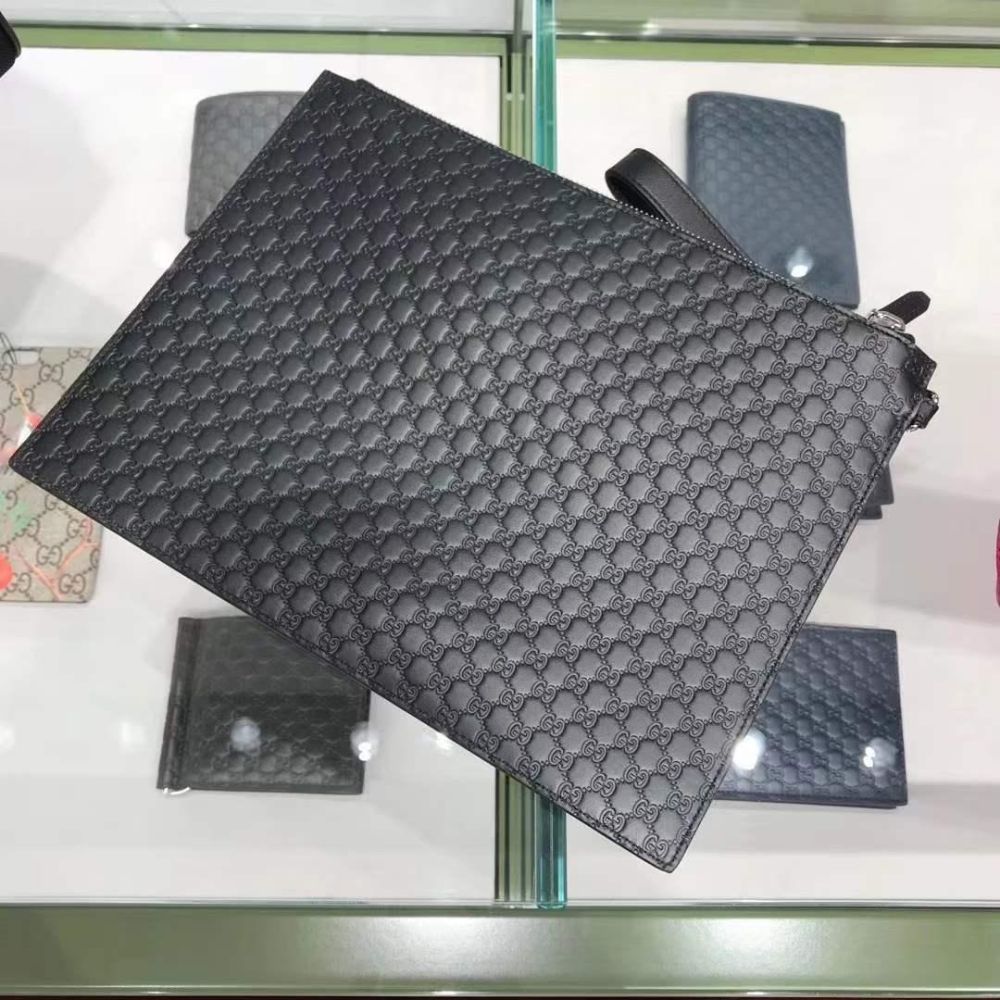 【国现秒发】Gucci 古驰满logo压纹GG 牛皮手包 黑色男士手拿包 