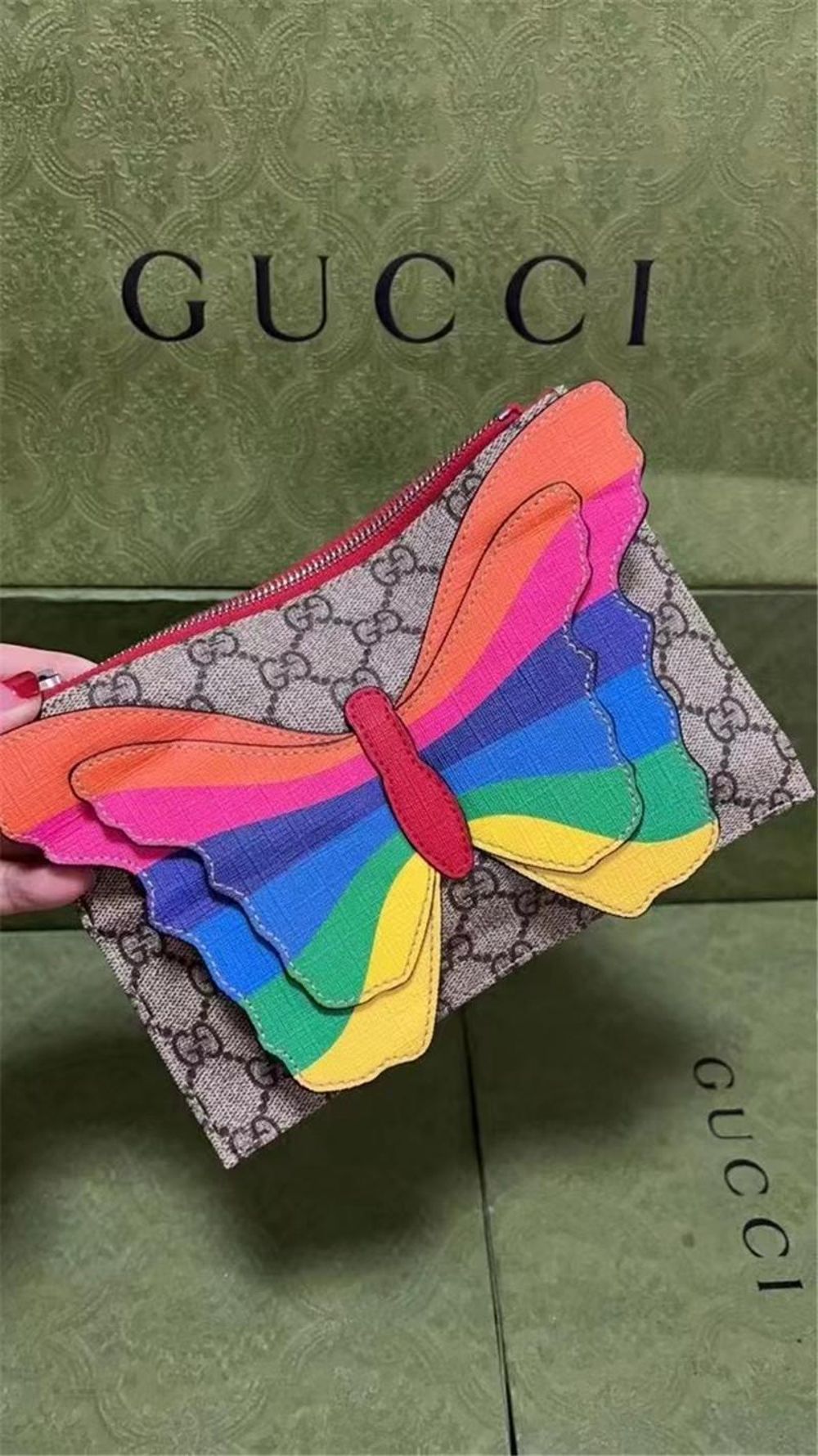 313gucci古驰女士蝴蝶结老花手包可以放手机车钥匙零钱等